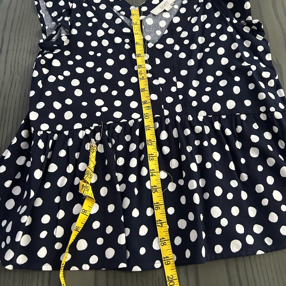 Loft Dot Flutter Peplum Top in size medium